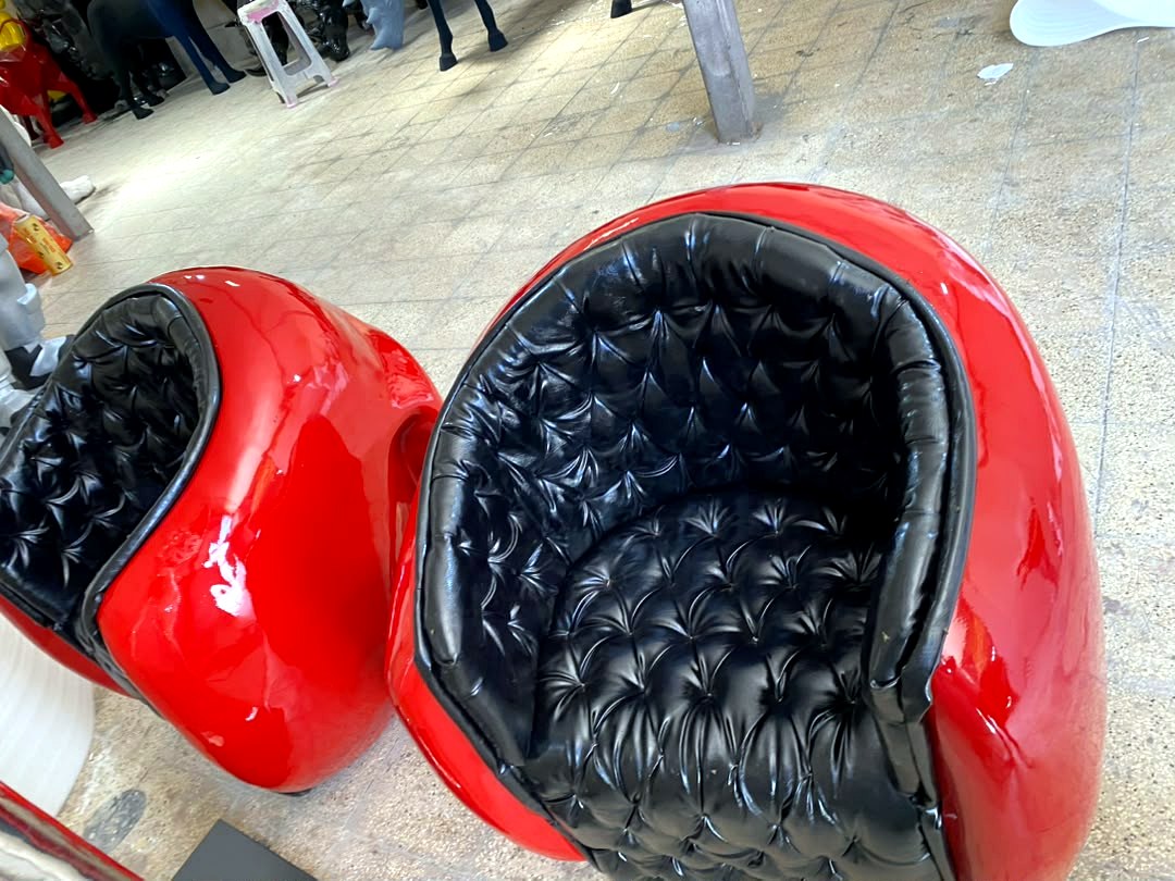 Boxing-glove armchairs — red lacquer