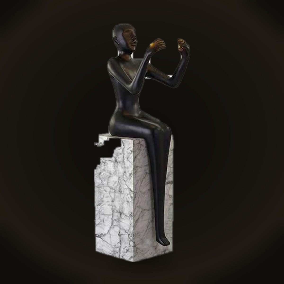 Seated bronze figure on marble base